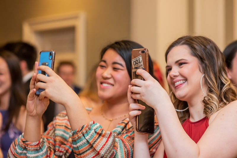 alumni taking selfie